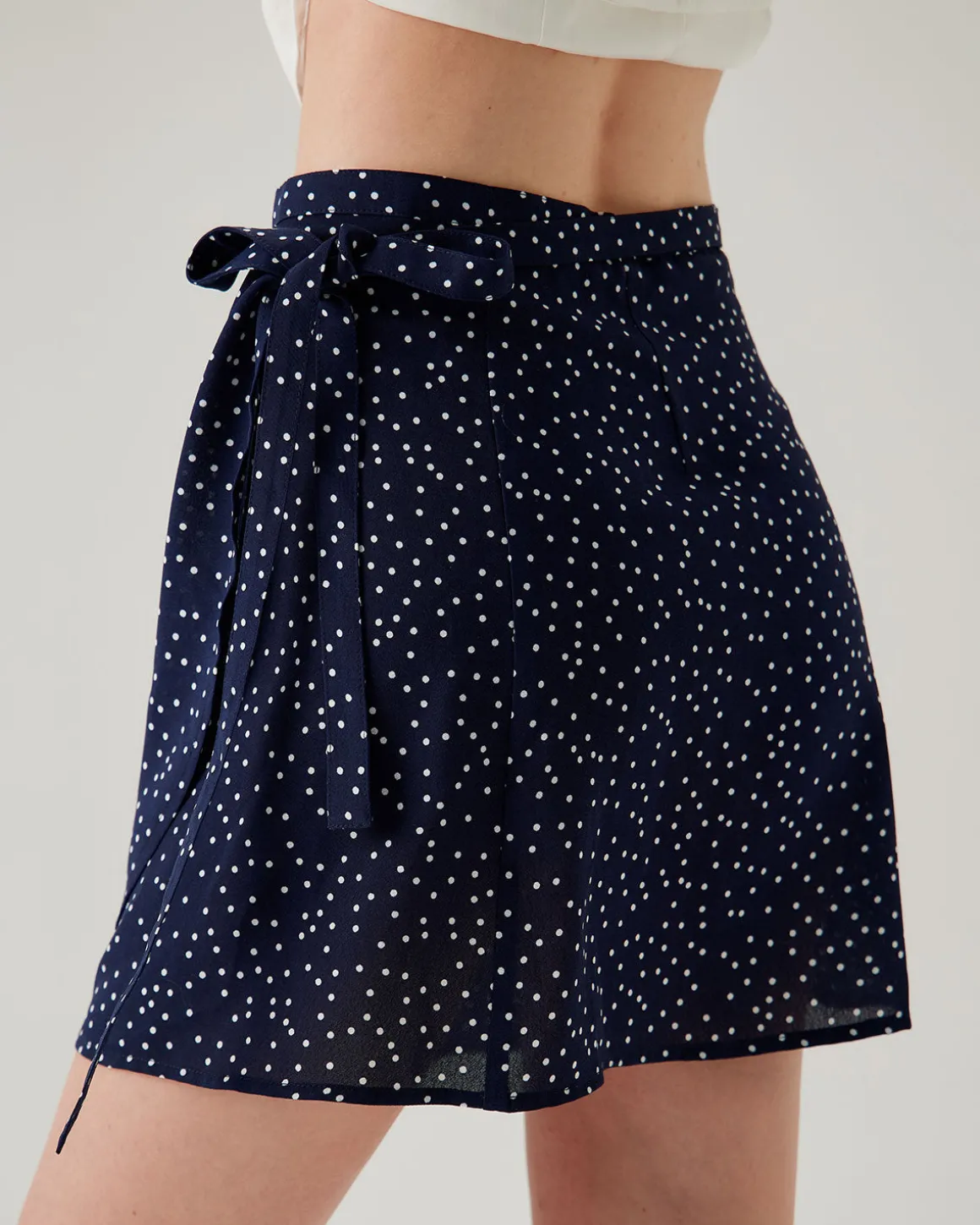 Navy Polka Dot Wrap Mini Skirt