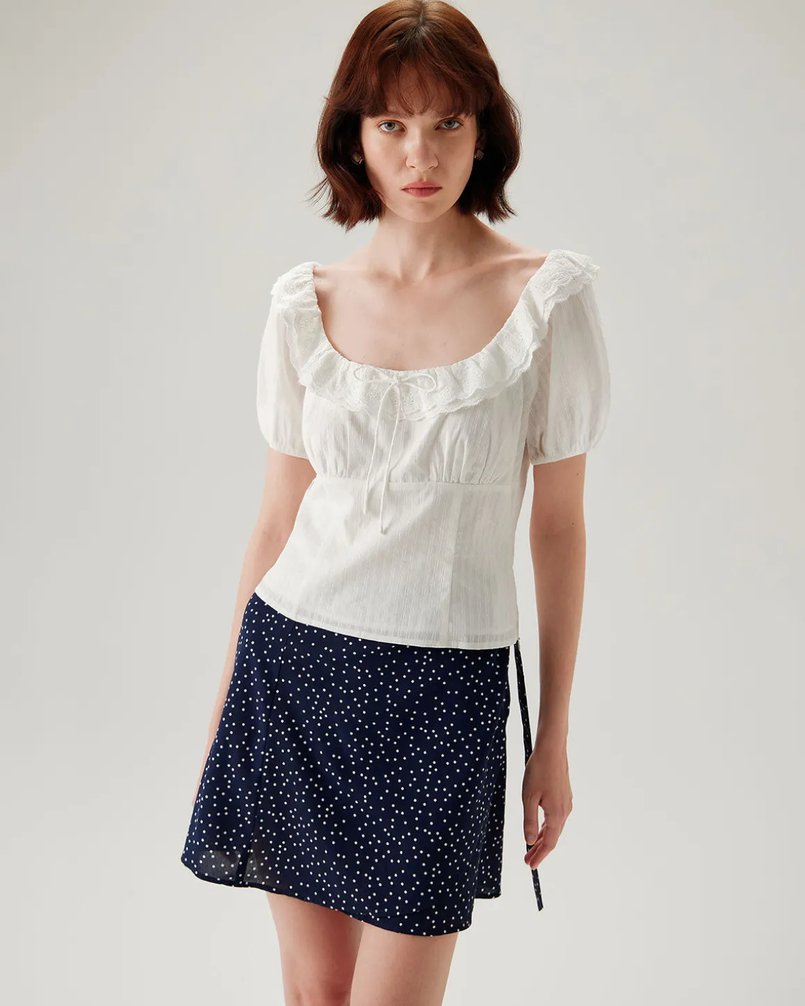 Navy Polka Dot Wrap Mini Skirt
