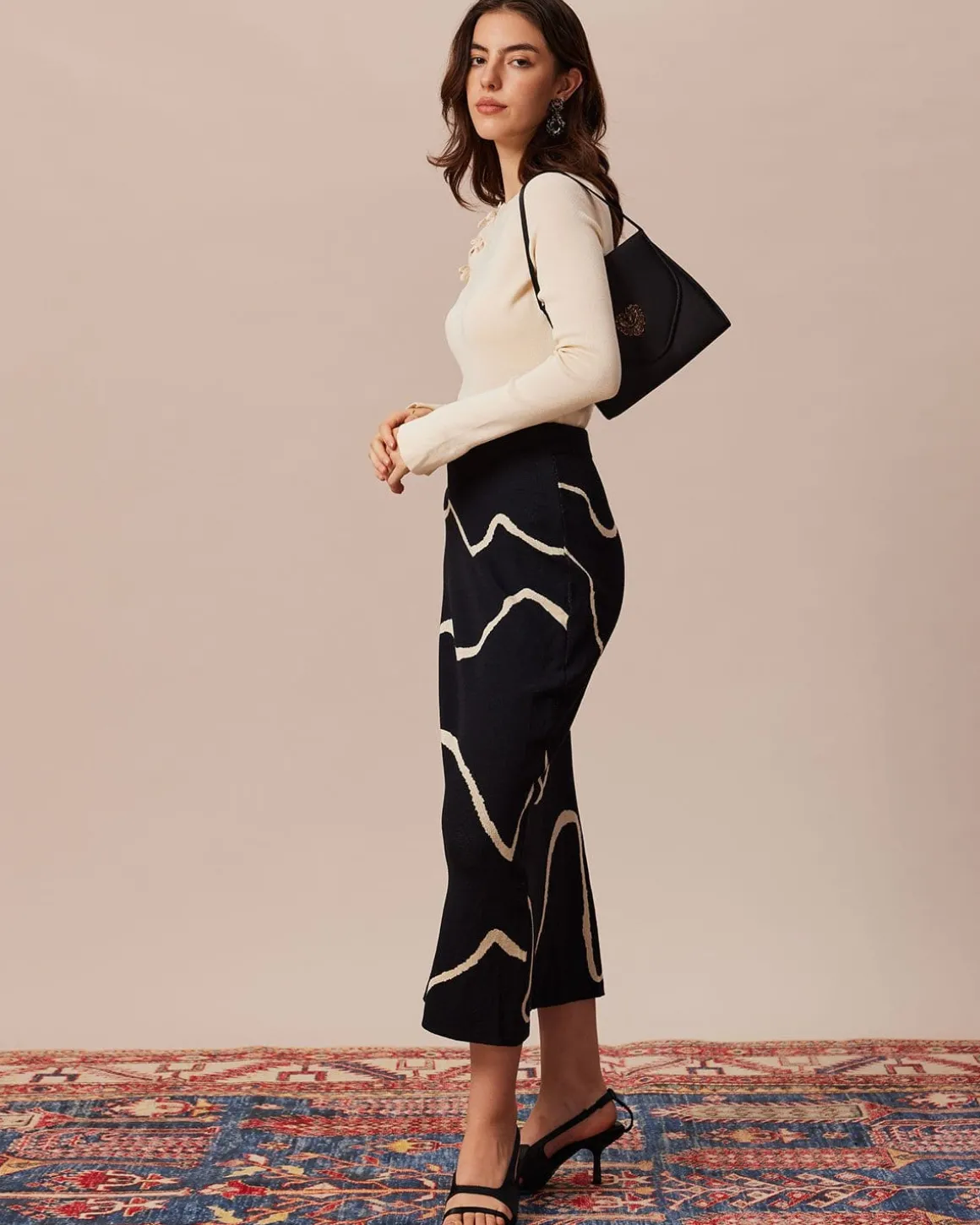 The Beige Ribbed Cut Out Bowknot Knit Top