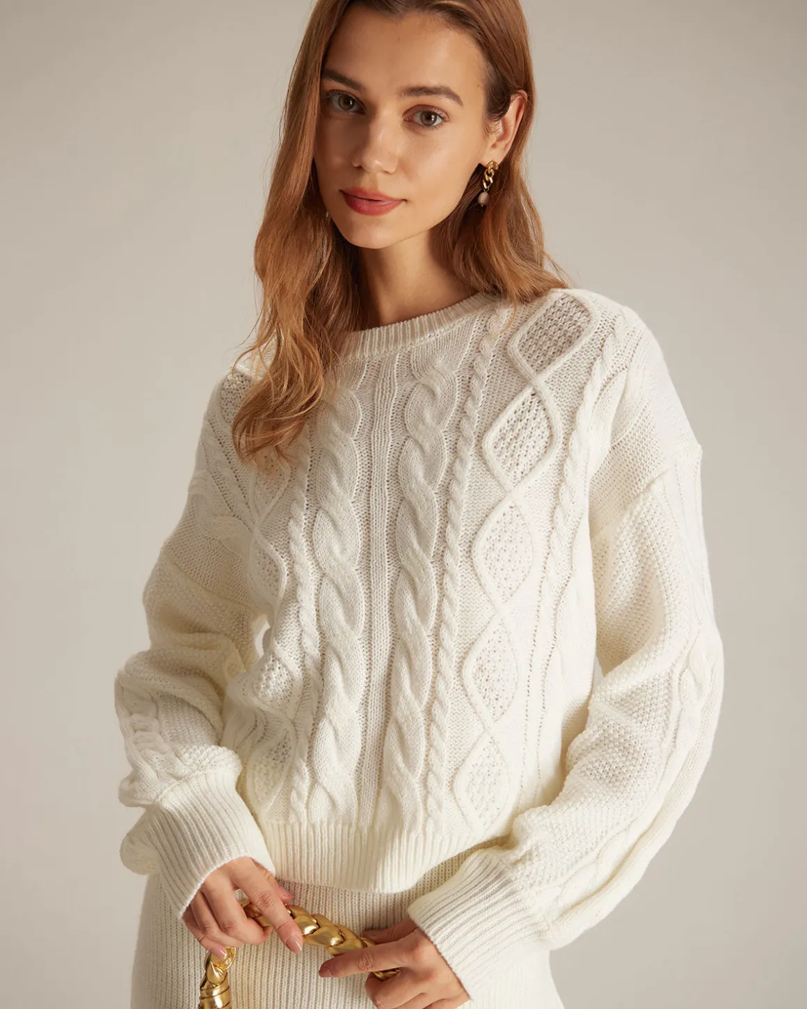 The Beige Round Neck Ribbed Cable Sweater