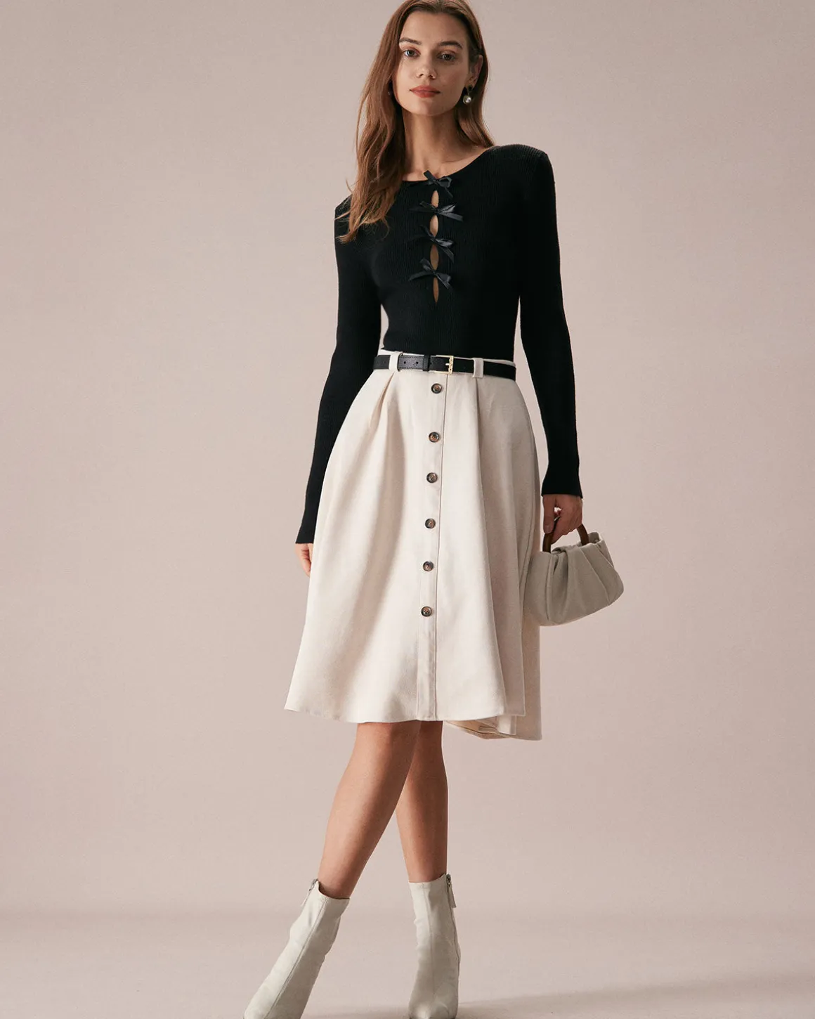 The Black Boat Neck Bowknot Front Knit Top