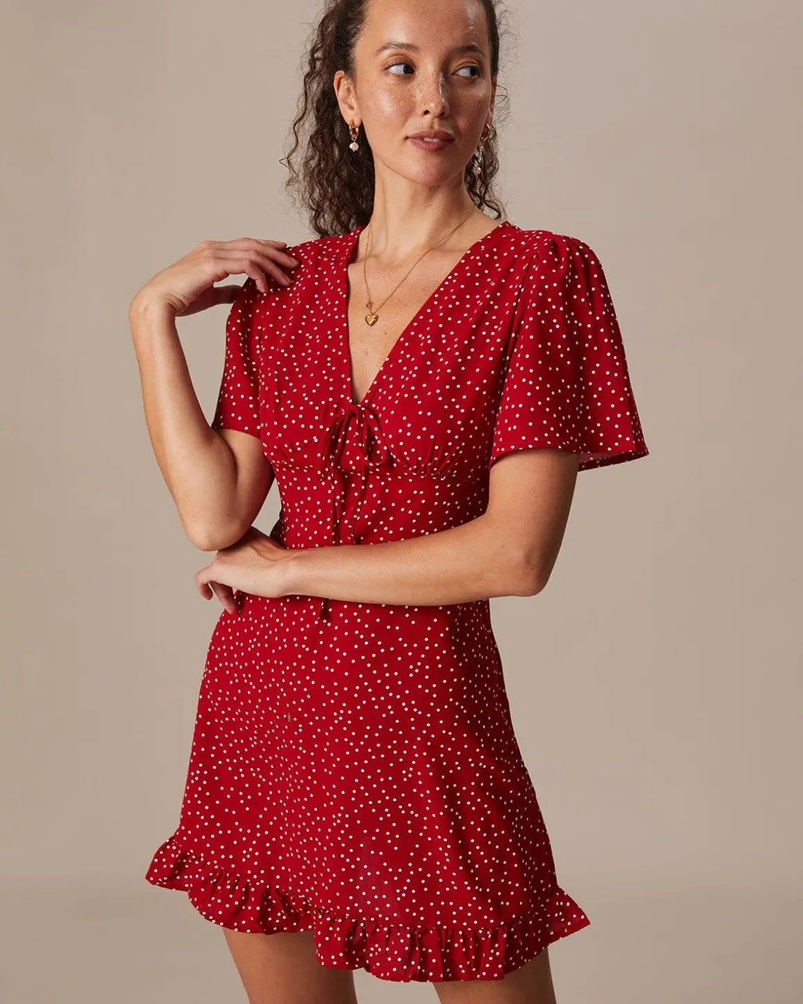 The Red V Neck Polka Dot Flounce Mini Dress