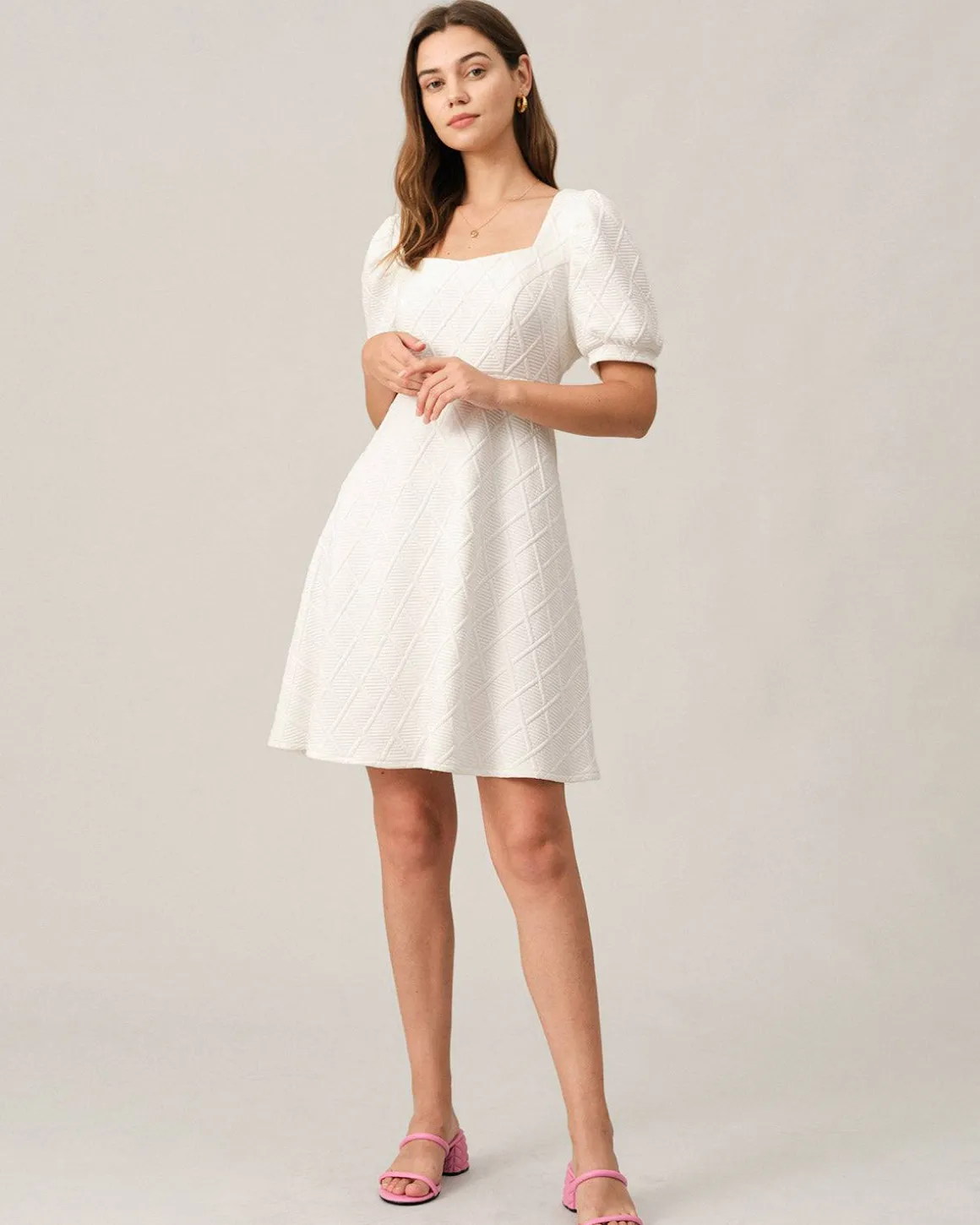The Solid Textured Puff Sleeve Mini Dress