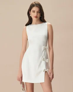 The White Boat Neck Bowknot Satin Mini Dress