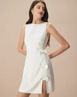 The White Boat Neck Bowknot Satin Mini Dress
