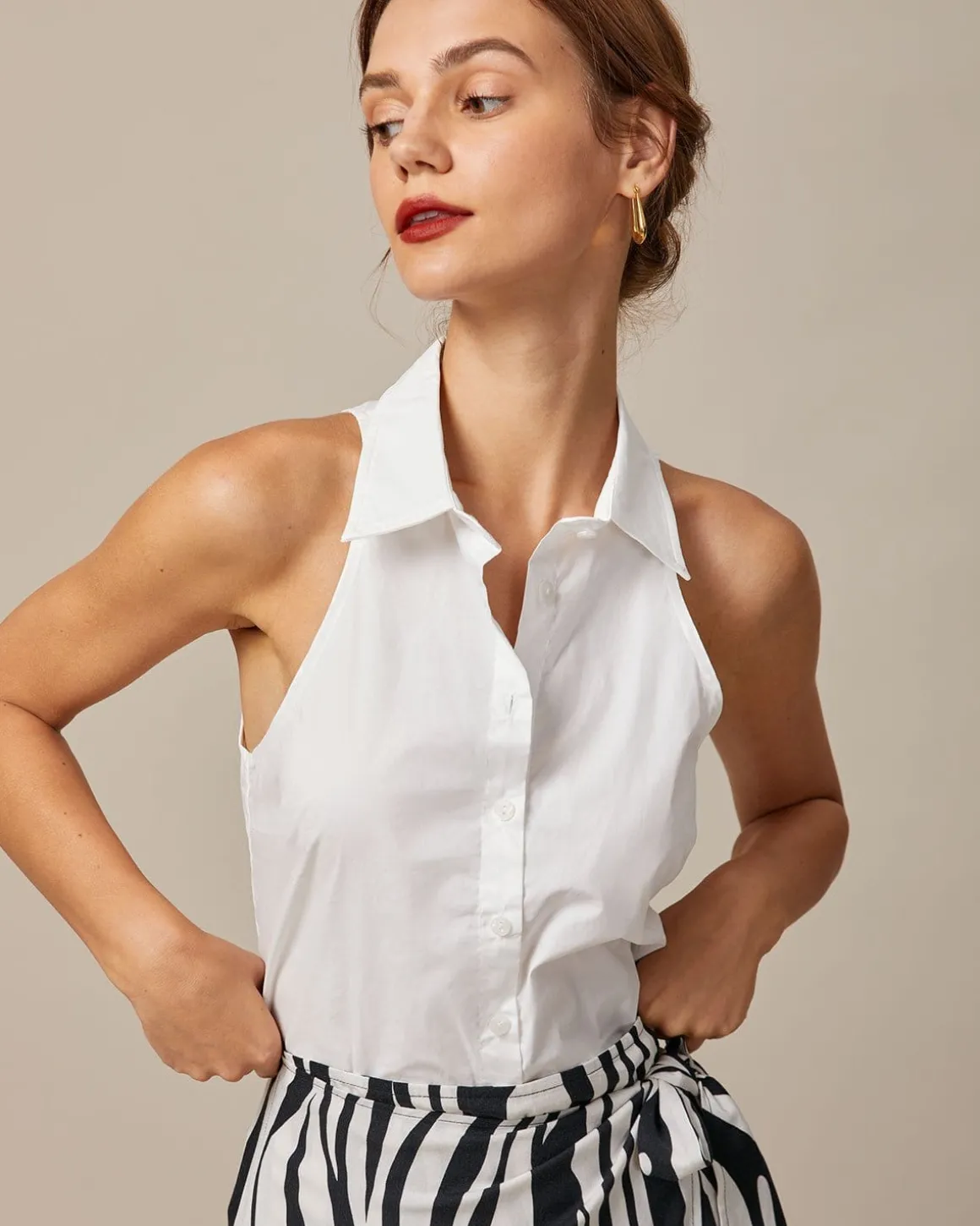 The White Collared Button Up Sleeveless Shirt