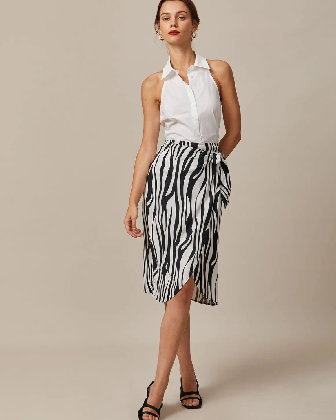 The White Collared Button Up Sleeveless Shirt