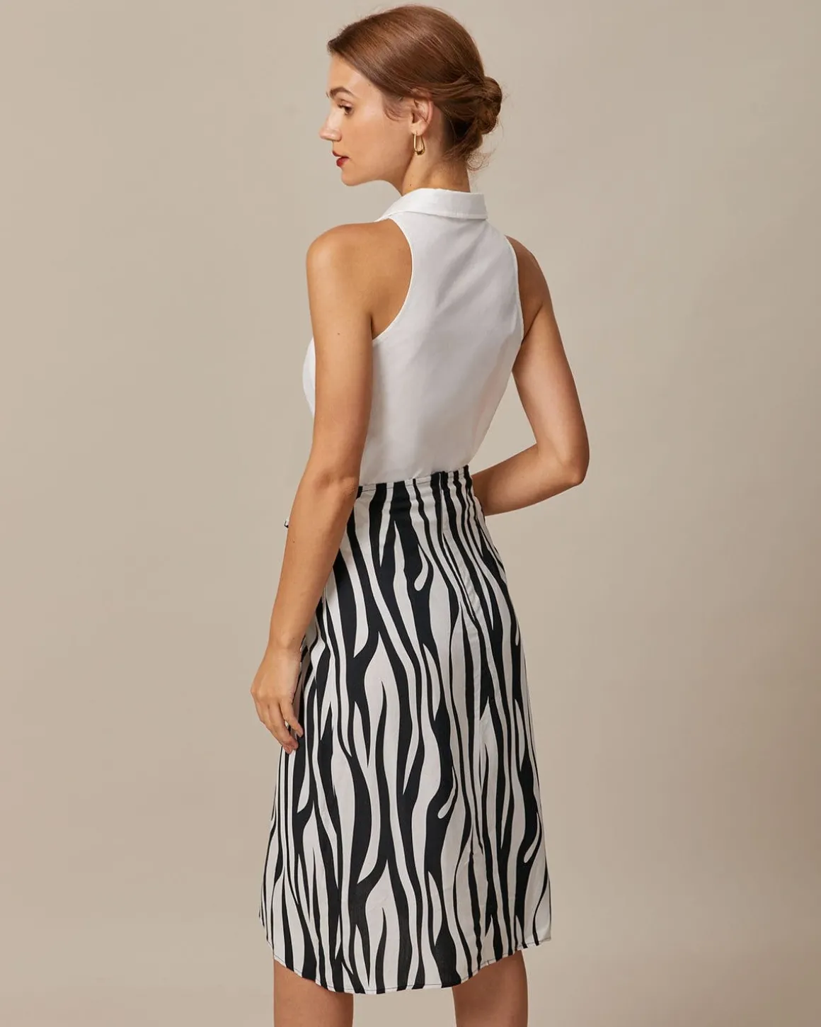 The White Collared Button Up Sleeveless Shirt