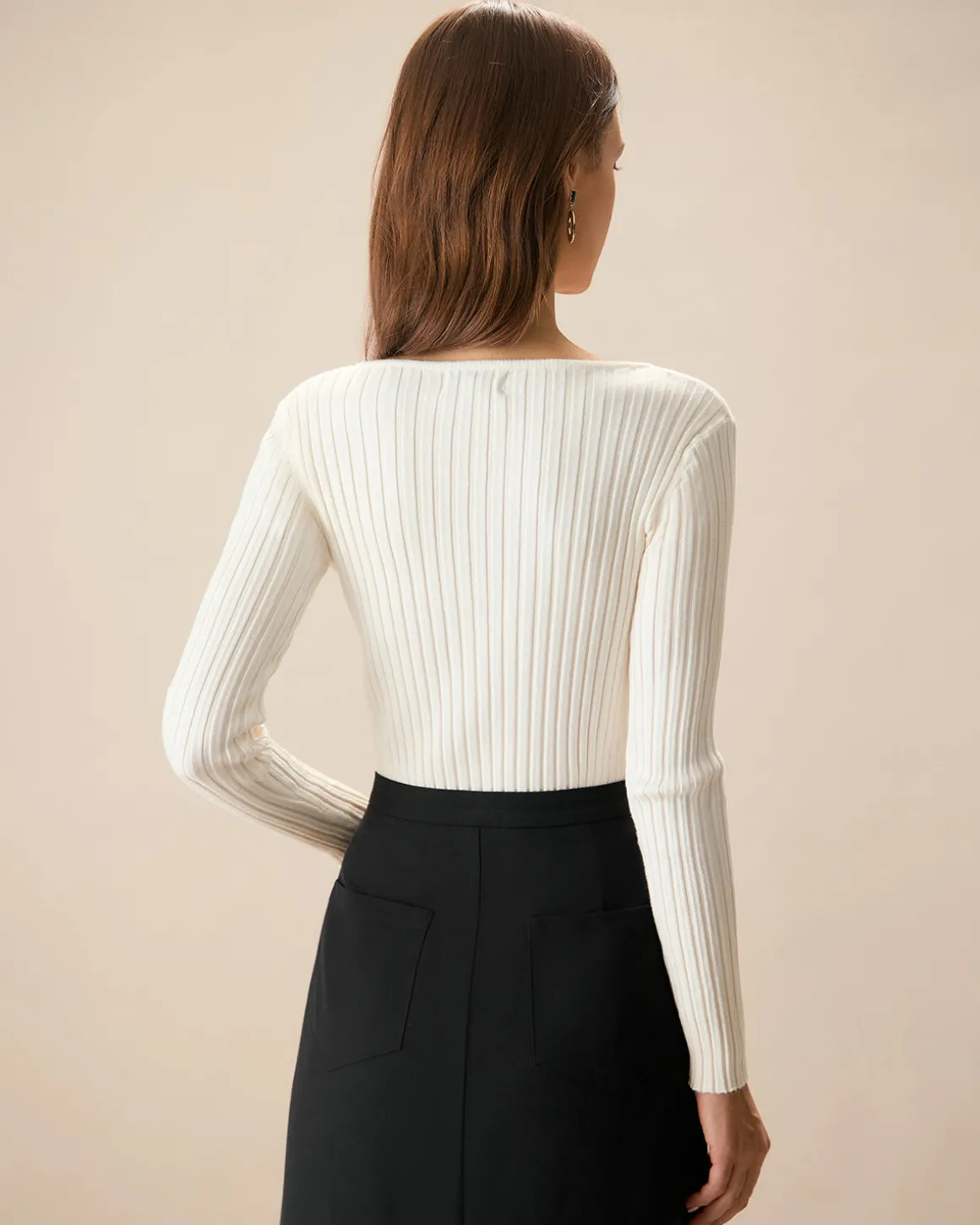 The White V Neck Teardrop Ribbed Knit Top