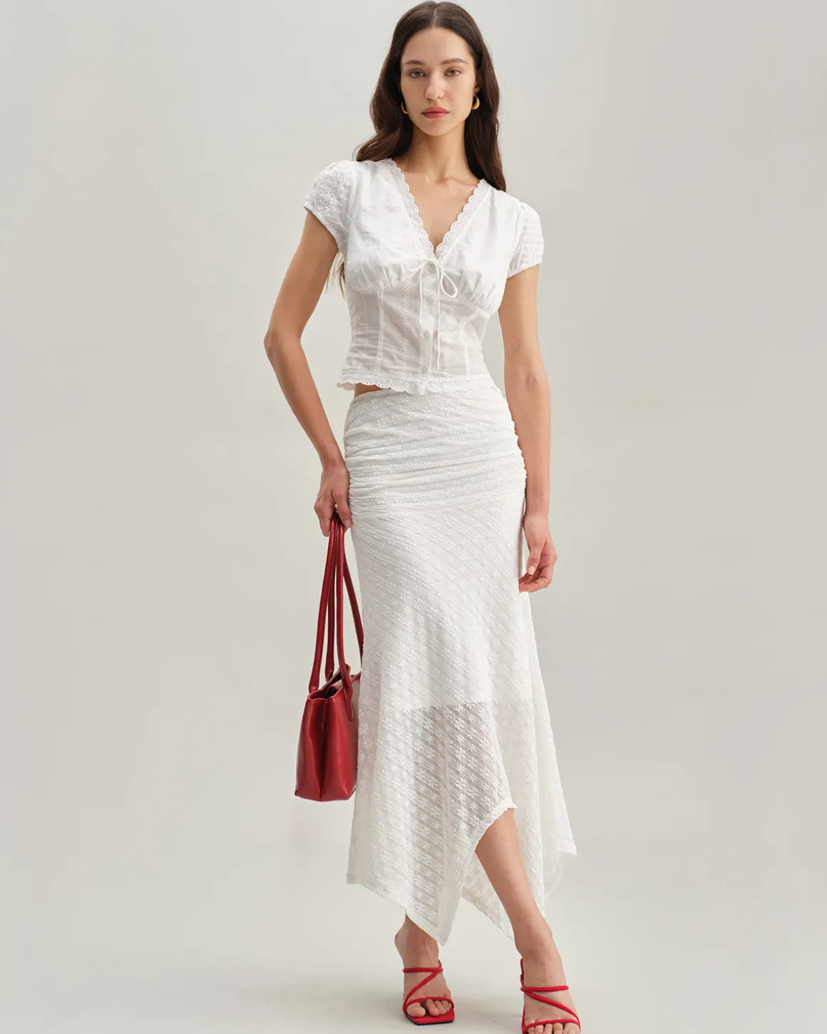 White Textured Cap Sleeve Blouse