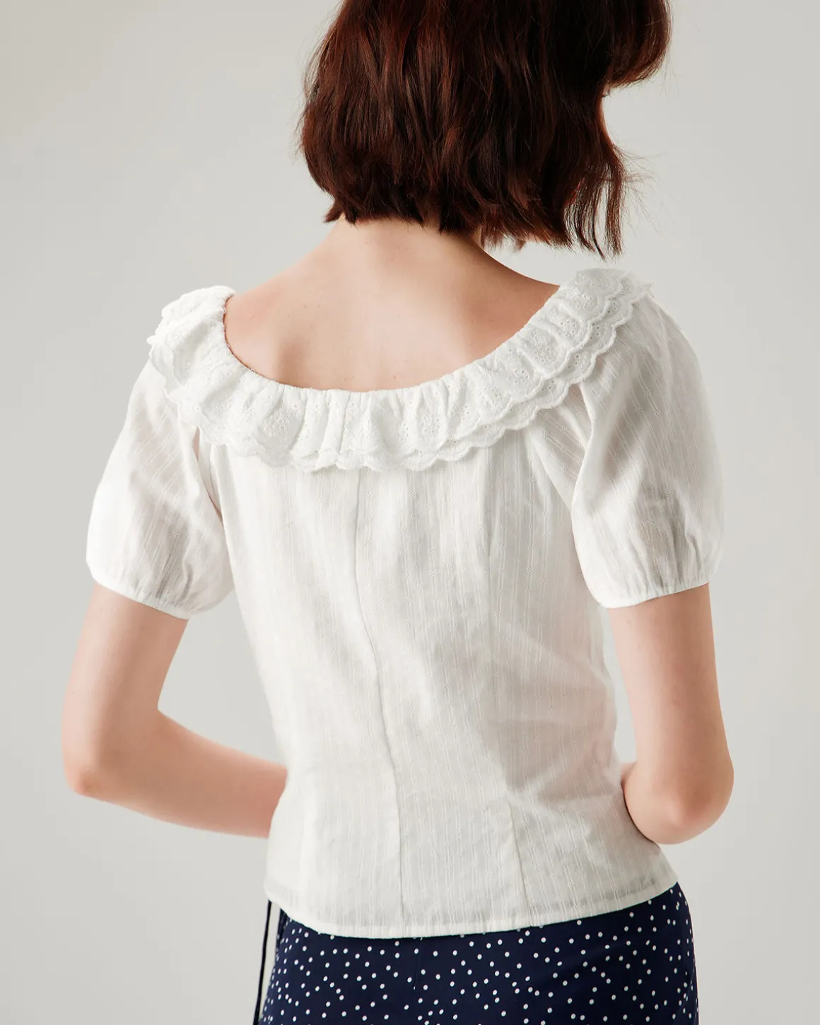 White Textured Scoop Neck Ruffle Blouse