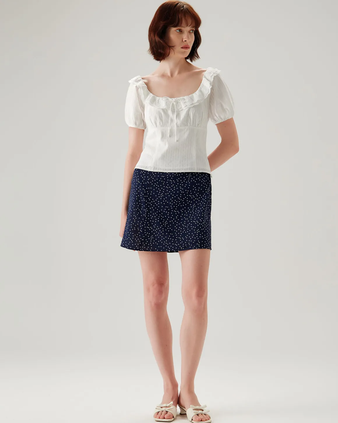 White Textured Scoop Neck Ruffle Blouse